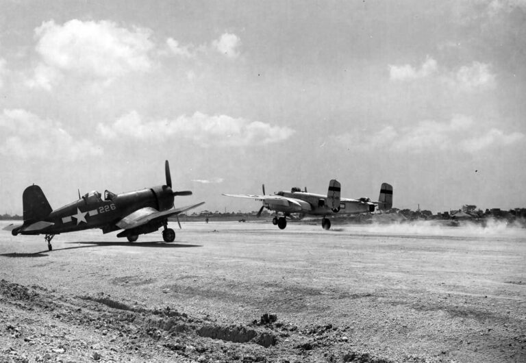 Vought F4U 4 Corsair White 226 waits for take off clearance as a B 25 lands on Iwo Jima 1945-01